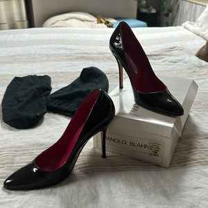 Manolo Blahnik Black patent leather pumps, never worn outside.